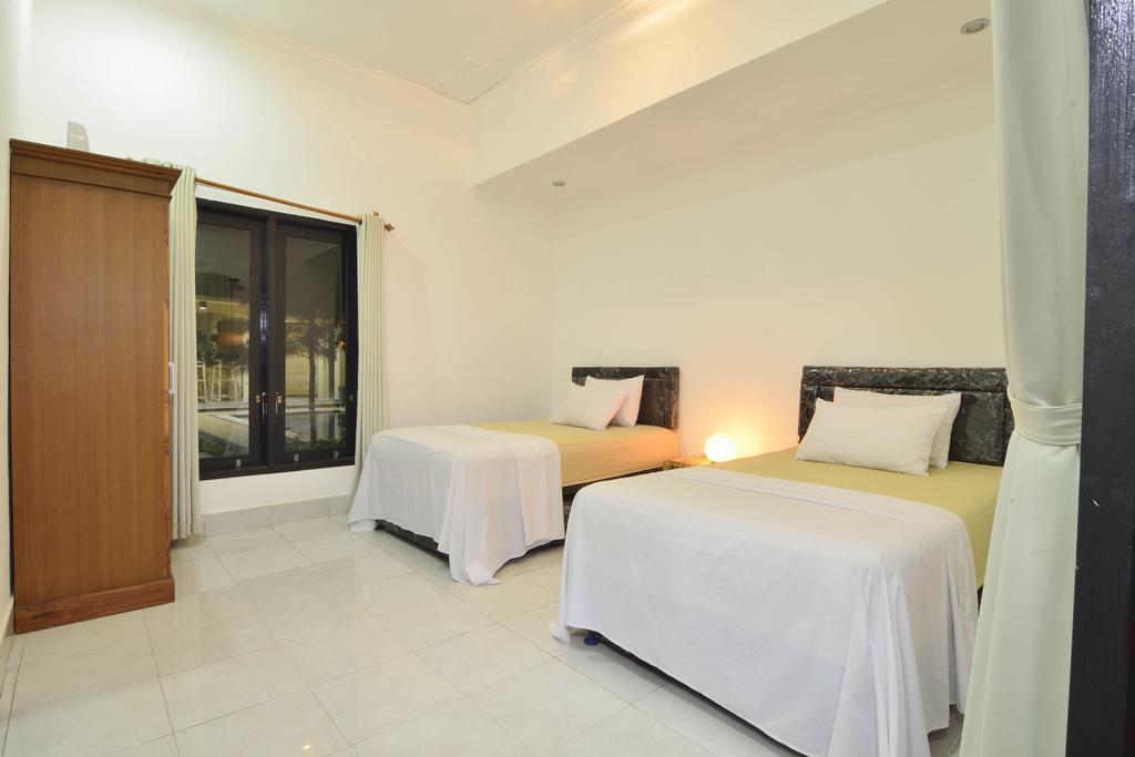 Santai Villa Kuta  Habitación foto